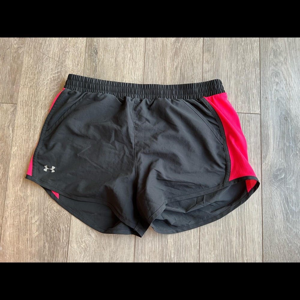 Under Armour running shorts. Like new